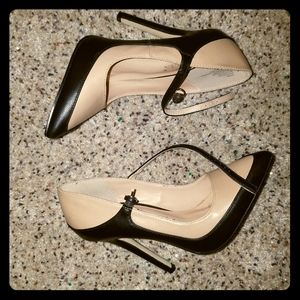 Cream and black pumps